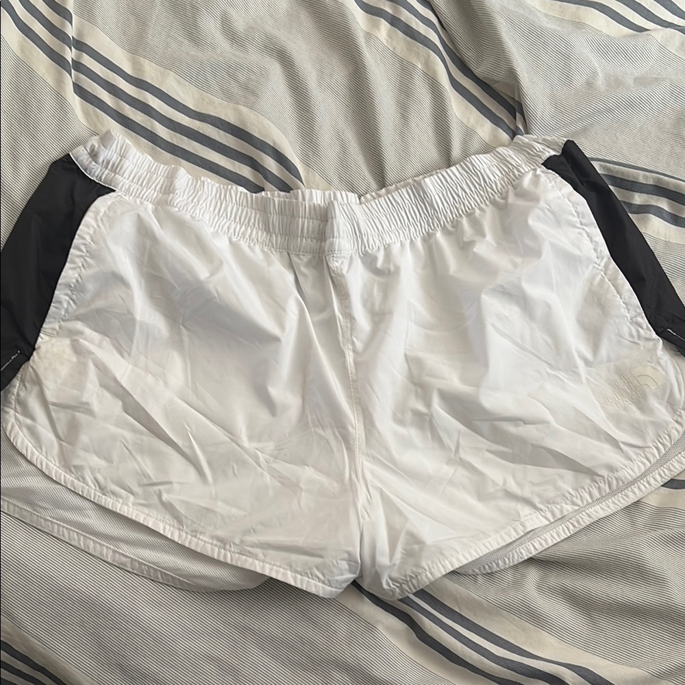 The North Face Woman’s White and Black Athletic Shorts
